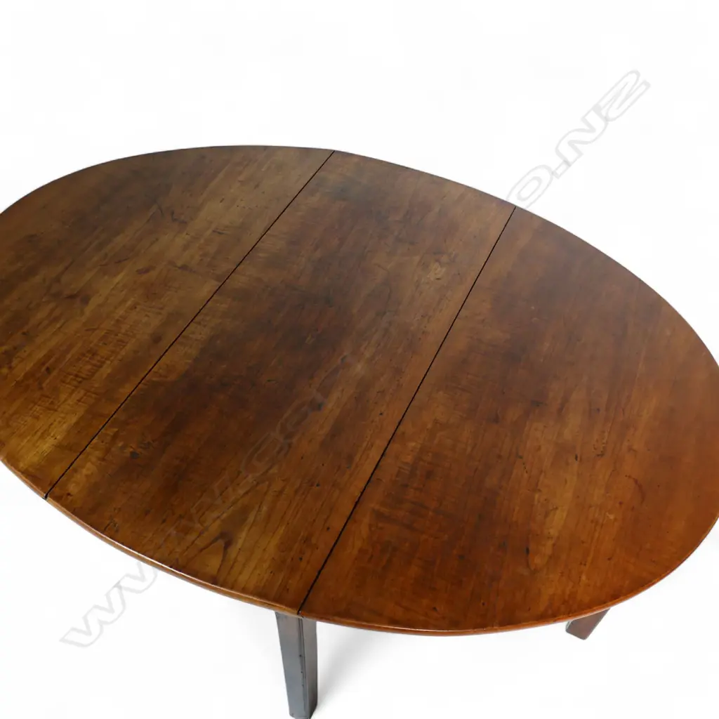 An English c.1770 oval flame mahogany drop leaf table, Image 1++